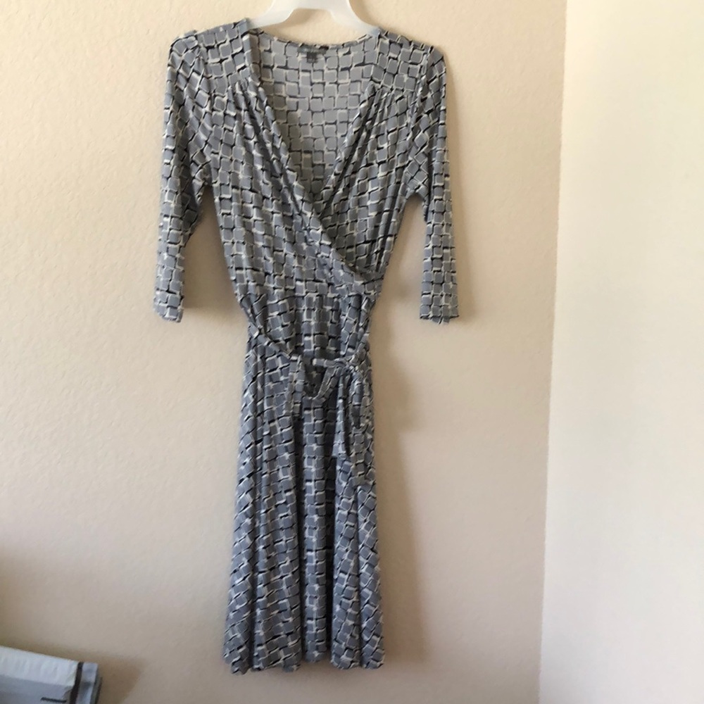 Gray printed color block wrap dress.